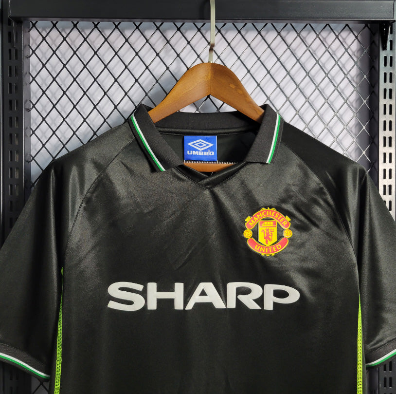 Maillot Manchester United Extérieur Noir – Saison 1998/1999 (Rétro)